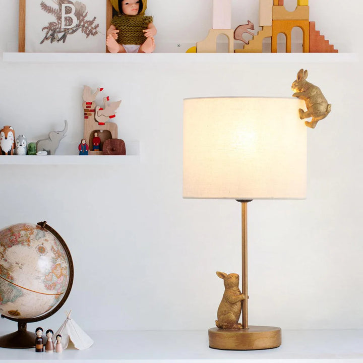 Quinn Playful Rabbits, Iron and Resin Table Lamp - Gold, White Fabric Shade, 450mm High, PL0252